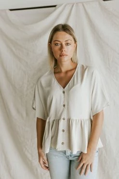 Henly Shae Peplum In Ivory Tops