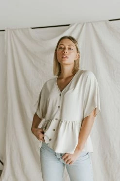 Henly Shae Peplum In Ivory Tops