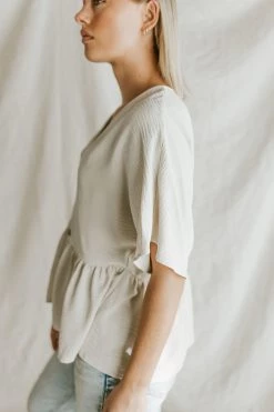 Henly Shae Peplum In Ivory Tops