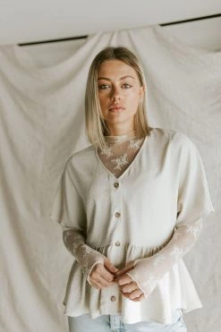 Henly Shae Peplum In Ivory Tops