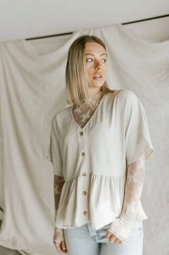 Henly Shae Peplum In Ivory Tops